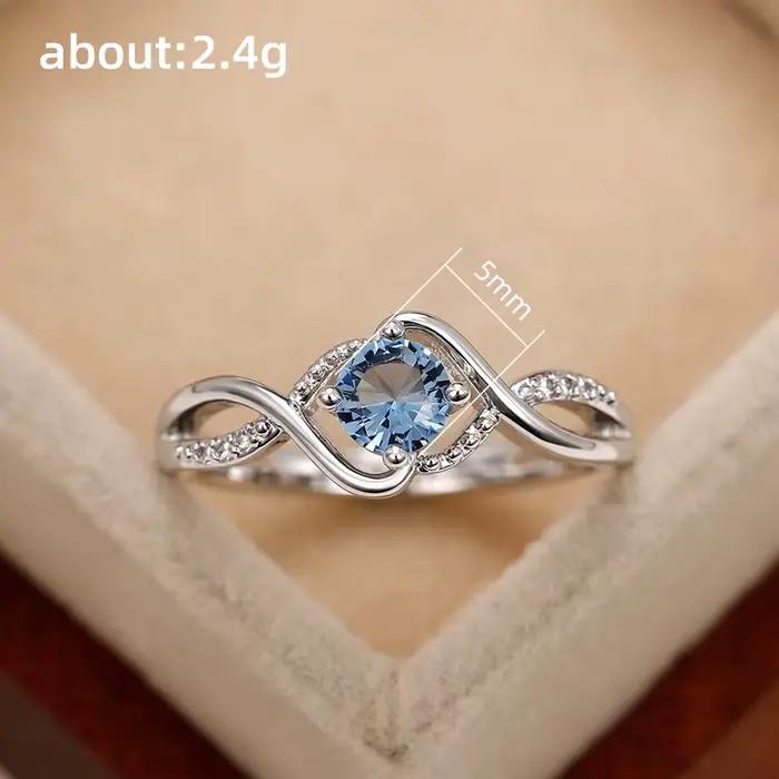 Alliance de mariage Huitan en laiton avec zircone cubique bleue, moderne et élégante pour mariage et anniversaire de mariage