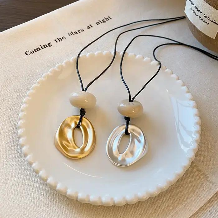 Nouveau collier pendentif irrégulier pour femme