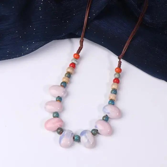 Collier de haricots en céramique coloré