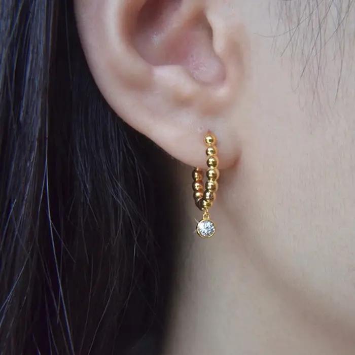 Huitan – boucles d'oreilles créoles délicates avec design perlé