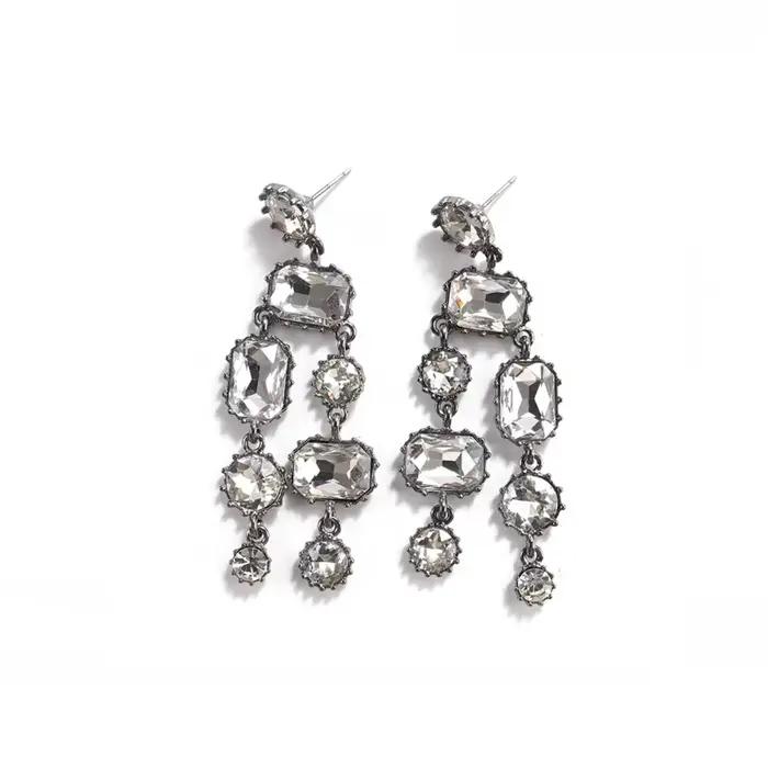 Boucles d'oreilles Art Déco martelées en maille dorée avec franges