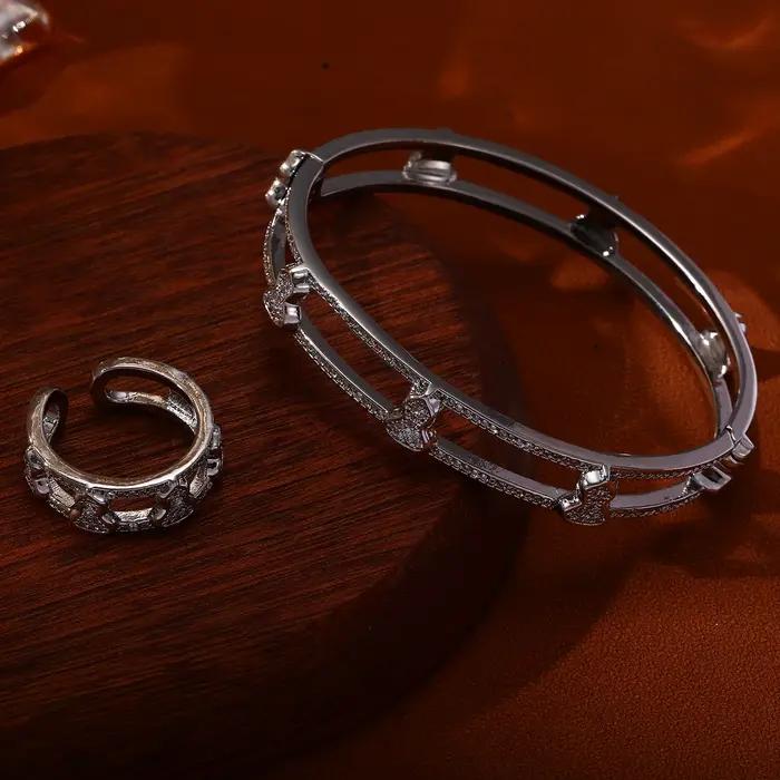 Ensemble bague et bracelet plaqué or avec nœud et zircons