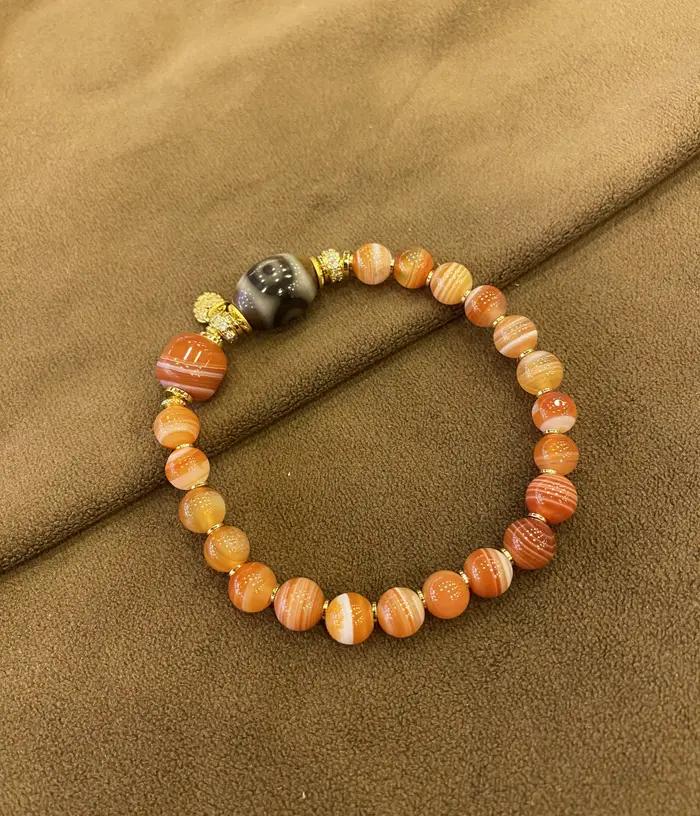 Bracelet monocouche en agate orange avec perle Dzi