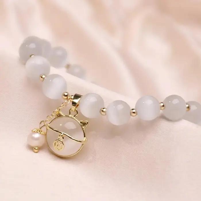 Bracelet en cristal opale élégant avec pendentif chat porte-bonheur pour femmes, bijou d'amitié à la mode, cadeau idéal pour les occasions spéciales