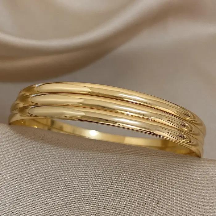 Bracelet en acier inoxydable plaqué or brillant 18 carats pour femmes