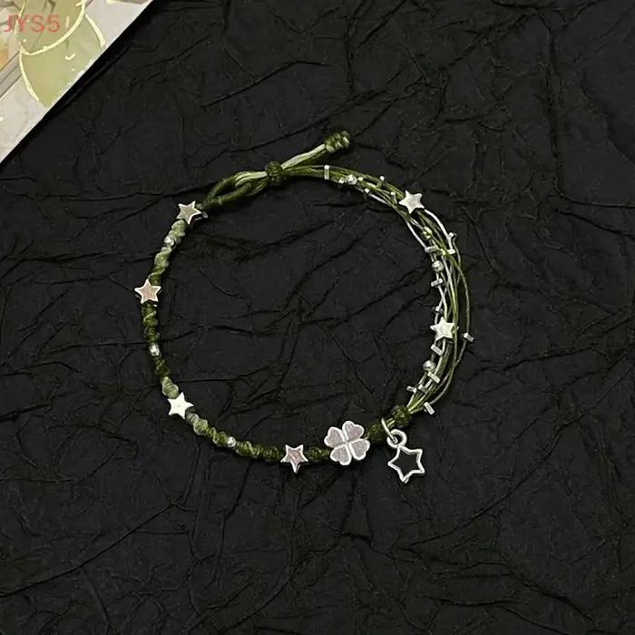 Bracelet tissé à la main trèfle à quatre feuilles