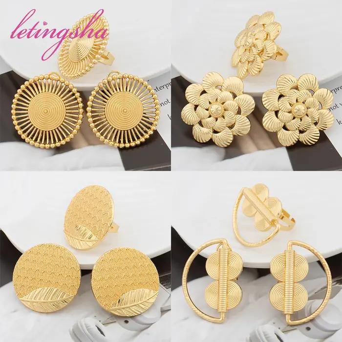 Ensemble de boucles d'oreilles et de matiques en or africain pour femmes