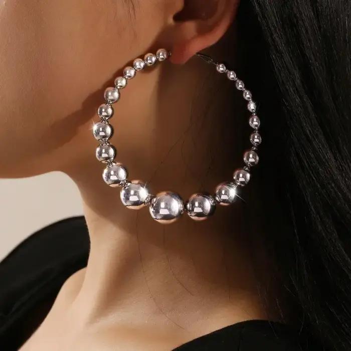 Boucle d'oreille rétro en perles CCB