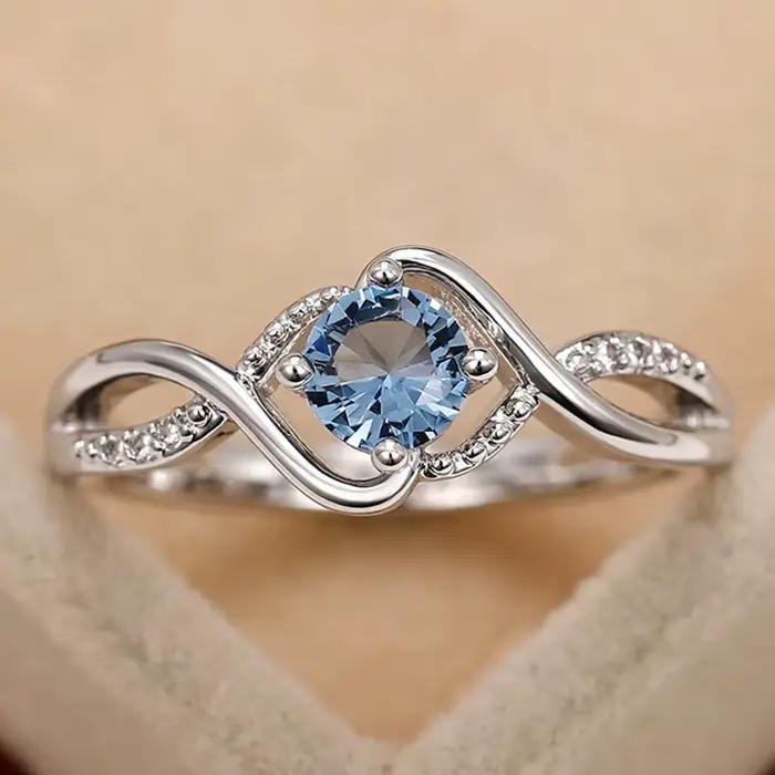 Huitan – bagues de mariage au Design moderne pour femmes, charmantes, zircone cubique bleue, haute q