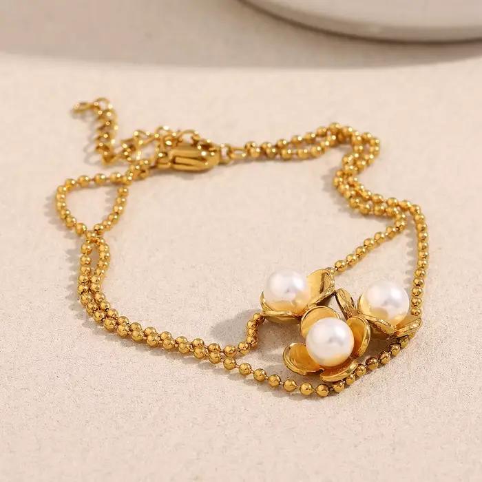 E.B.belle nouvelle chaîne de perles trois fleurs Bracelet de perles plaqué or 18 carats en acier inoxydable Style élégant accessoires de bijoux pour femmes