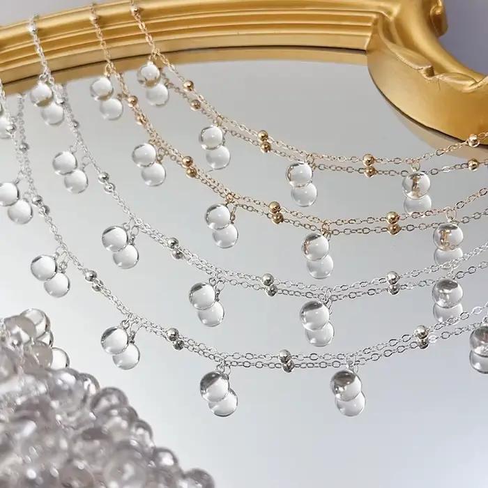 Pendentif en perles de verre rondes transparentes avec chaîne en métal pour créer des colliers et bracelets élégants pour femmes occasions spéciales