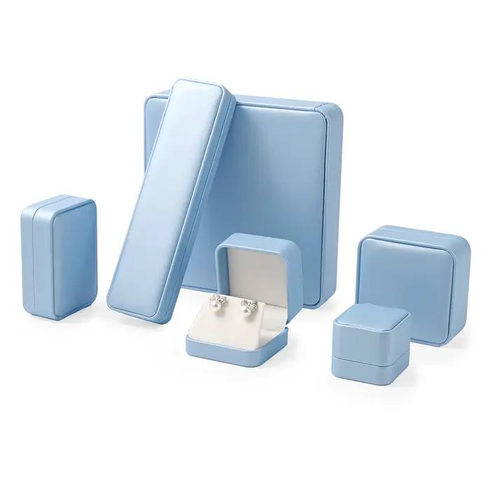 Boîte à bijoux bleue de qualité supérieure avec doublure en velours pour rangement et protection de colliers bagues boucles doreilles et bracelets occasions spéciales famille bijoutier