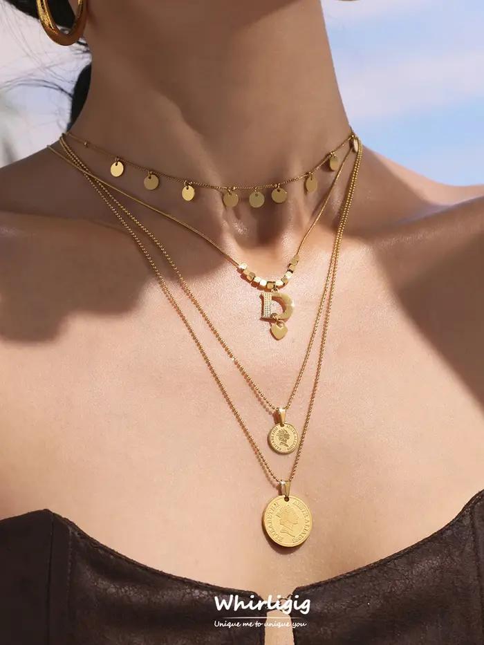 Collier long pour femme en acier inoxydable plaqué or avec pendentif rond motif portrait de reine et pompon bijou de luxe pour banquet et anniversaire