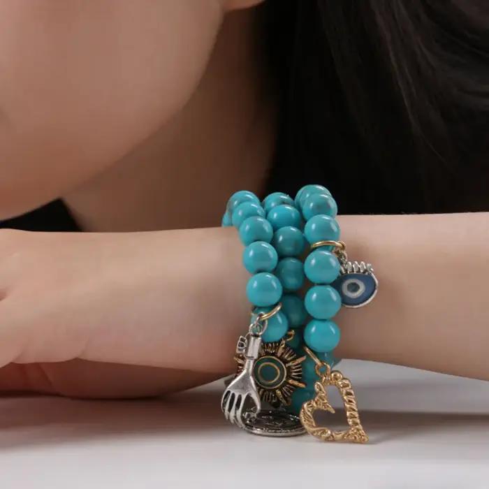 Bracelet bohème turquoise multi-breloques avec breloque œil porte-bonheur