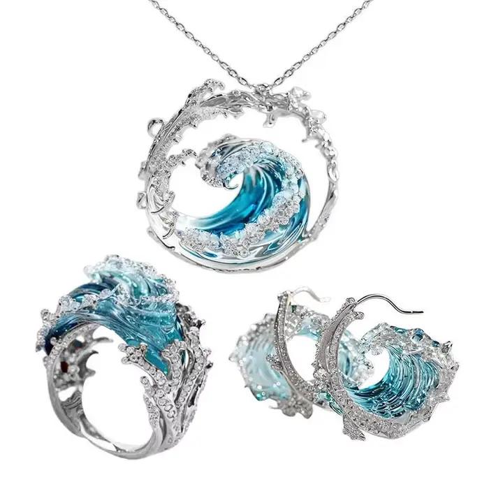 Ensemble de bijoux Ocean's Oath collier bague boucles d'oreilles cadeau femme océan bleu ciel or jaune clair océan tranquille occasions spéciales