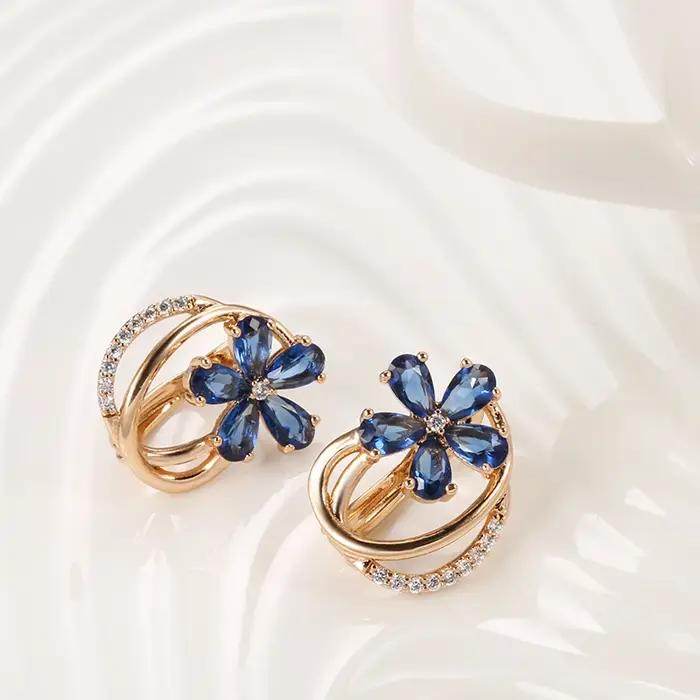 Boucles d'oreilles en or rose avec motif vintage en relief espagnol