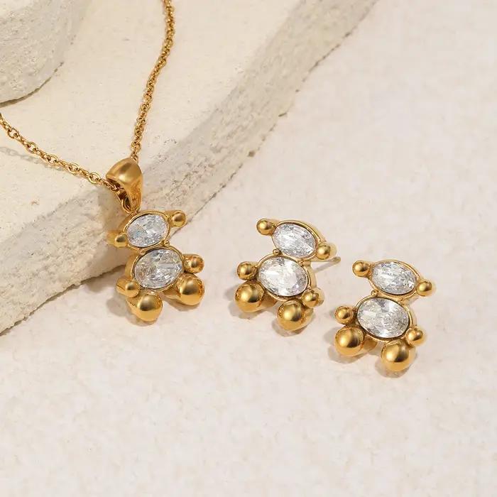 Ensemble de bijoux ours mignon plaqué or hypoallergénique collier et boucles d'oreilles pour femme occasions sociales style classique polyvalent