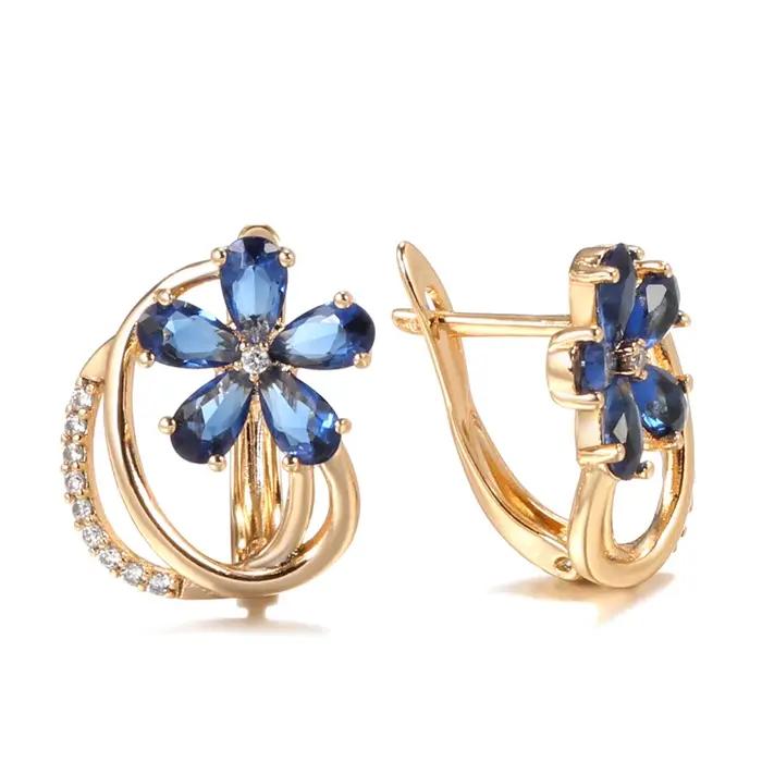 Boucles d'oreilles en or rose avec motif vintage en relief espagnol