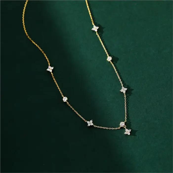 ANENJERY incrusté Zircon quatre feuilles fleur chaîne collier pour les femmes nouvelle Niche lumière de luxe mode chaude colliers ras du cou accessoires