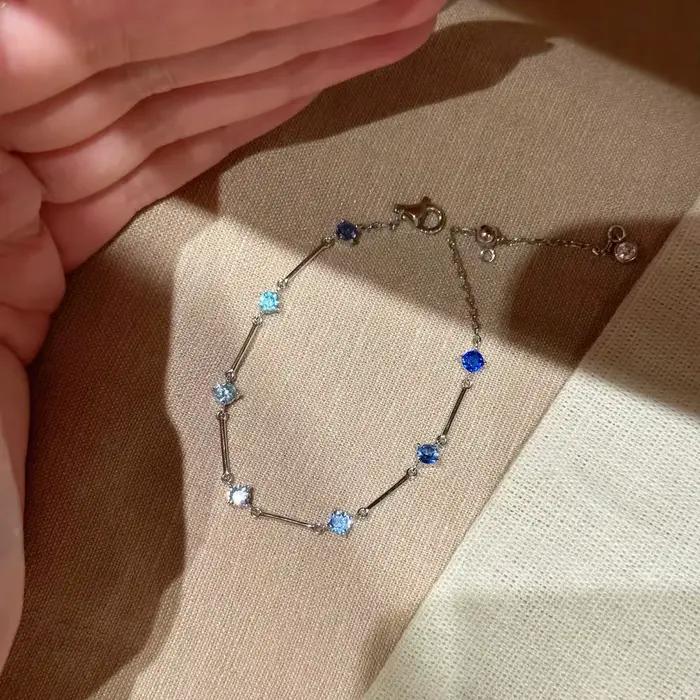 Bracelets haut de gamme en diamants bleus frais pour femmes, avec longue chaîne brillante, design minimaliste, accessoires de bijoux de fête