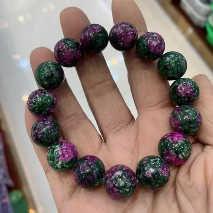 Bracelet de perles rondes en jade de fleur de pêcher colorée