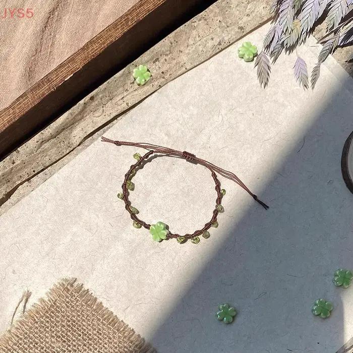 Bracelet tissé à la main trèfle à quatre feuilles