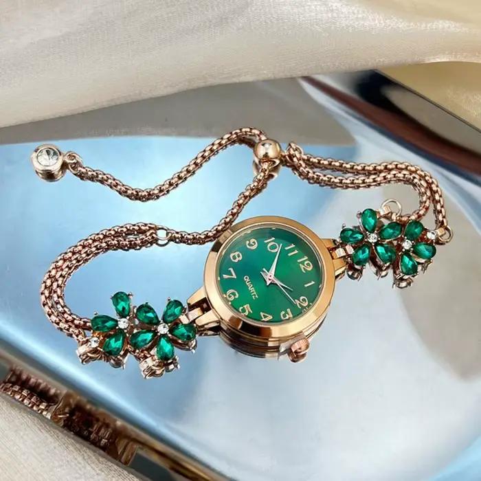 Montre-bracelet femme élégante à quartz avec motif fleurs boîtier métal et boucle bijoux pour style luxe affaires et sport