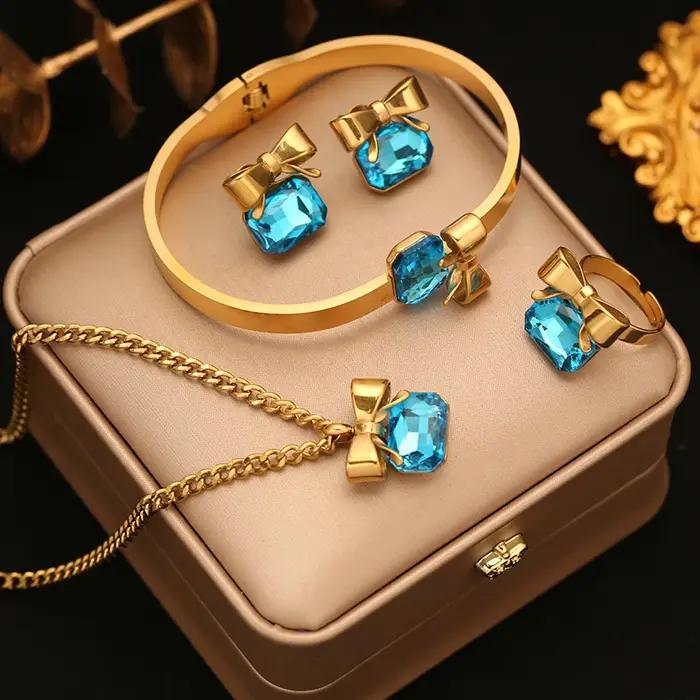 Bijoux Élégants EILIECK - Ensemble Collier Carré à Nœud Papillon, Boucles d'Oreilles, Bague et Bracelet pour Femmes Occasions Spéciales