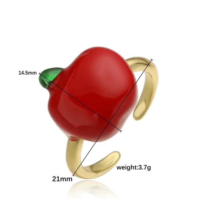 Bague en laiton plaquée or 18 carats avec pomme rouge émaillée ajustable pour femmes occasions générales style moderne bijou unique