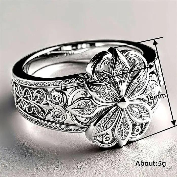 Bague de cocktail Huitan gravée de fleurs géométriques élégante pour femmes occasions spéciales partys mariages