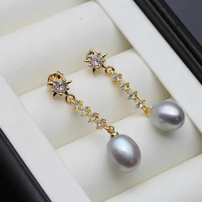 Bijoux de boucle d'oreille de perle de femme moderne