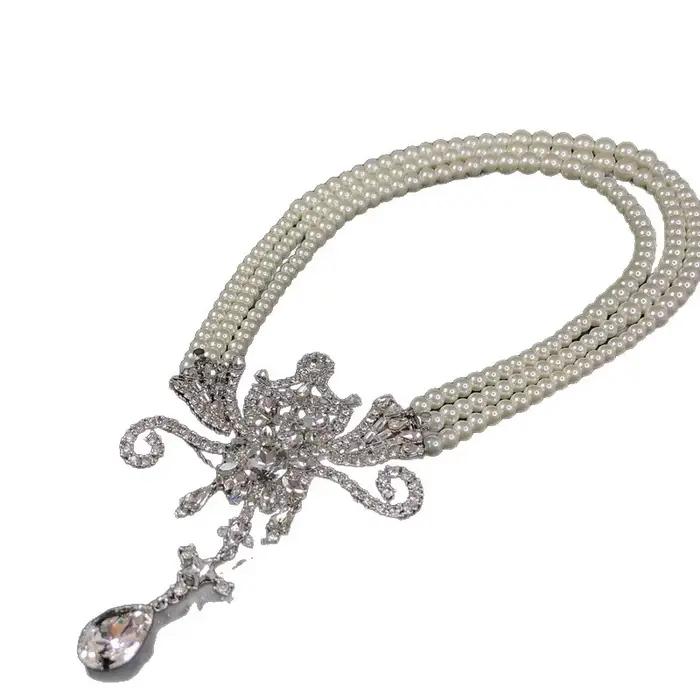 Ensemble de colliers superposés en perles de luxe avec pendentif broche aile de diamant