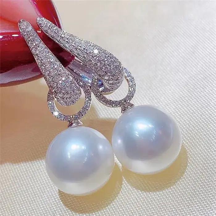 Boucles d'oreilles pendantes en zircone cubique scintillante élégantes et modernes pour femmes occasions spéciales