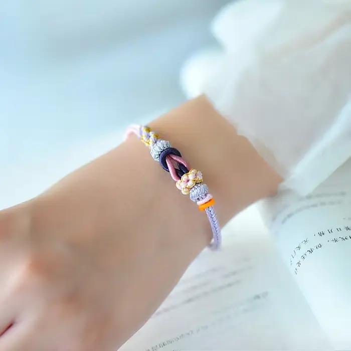 Bracelets de ULrouge tressés réglables pour femmes