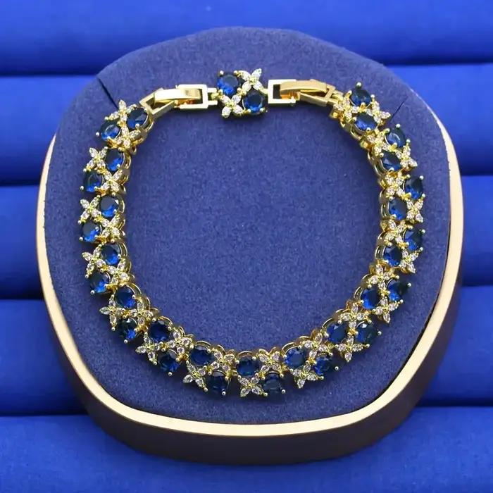 Luxueux bracelet vintage en zircone bleue plaqué or 18 carats pour femme