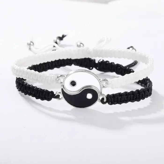 1 lot de 2 bracelets de réglage télescopique tressés en corde Yin et Yang simples Tai Chi Bagua noir et blanc pour hommes et femmes Coupl