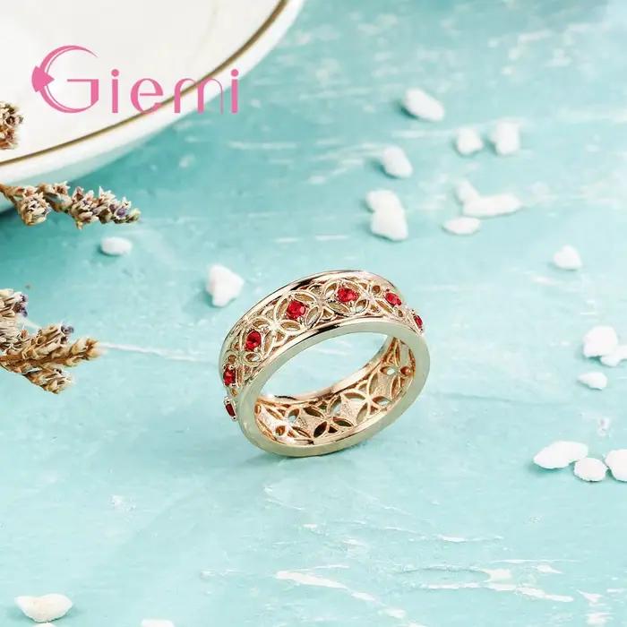 Bague centrale en cristal rouge incrusté creux pour femmes, couleur or Rose de haute qualité, bijoux à la mode, cadeau de fête d'anniversaire pour filles heureuses