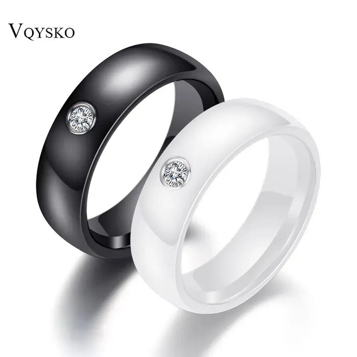 Bague en céramique noire et blanche avec cristal pour engagement et occasions spéciales hommes femmes style classique modernité