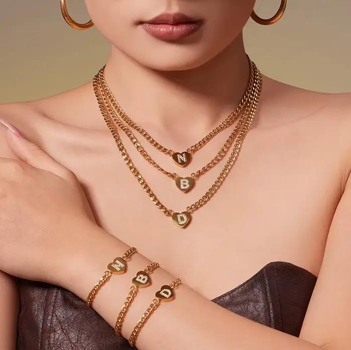 Liora coeur cubique zircone lettre pendentif collier Bracelet pour femmes en acier inoxydable chaîne cubaine Mujer Hip Hop ensembles de bijoux