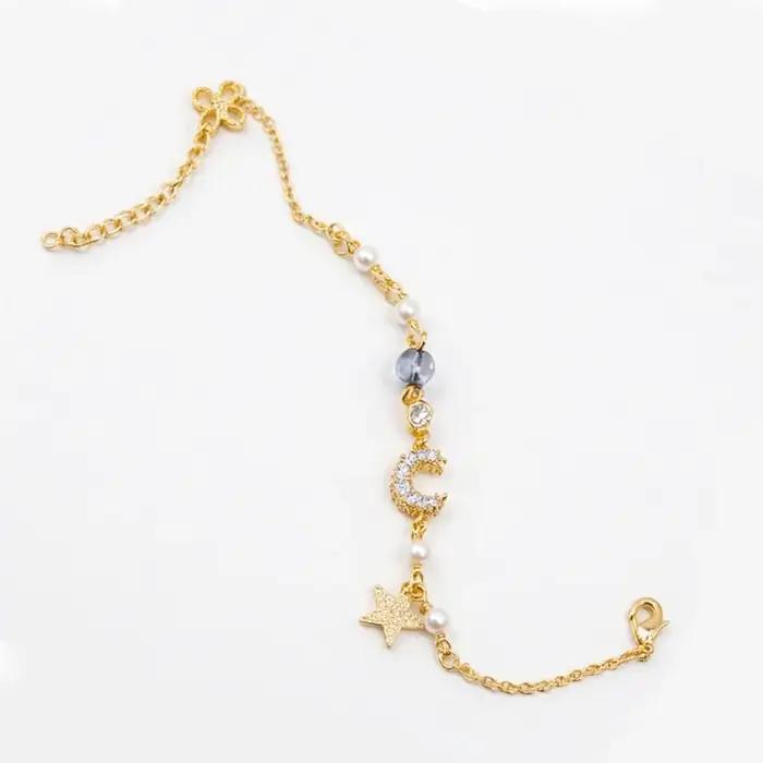 Bracelet bohème plaqué or 14 carats avec lune et étoile pour femme