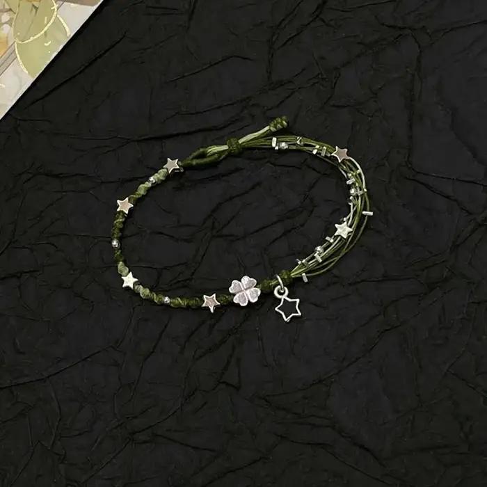 Bracelet tissé à la main trèfle à quatre feuilles