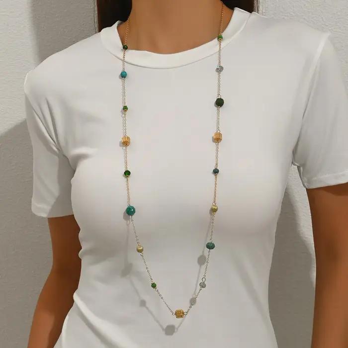 Collier long de style bohème tressé avec des perles en bois et de la herbe pour un usage décontracté