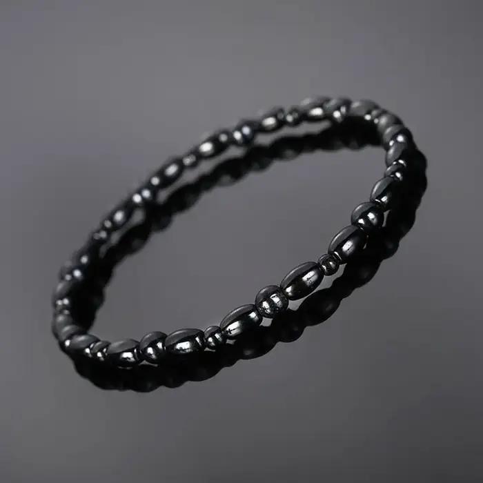 Bracelet de cheville en pierre noire magnétique avec perles en hématite noire pour femmes, élégant et confortable pour toutes les occasions