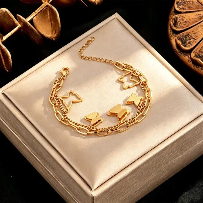 Bracelet pour femme en acier inoxydable avec motif papillon et chaîne de maillons élégante