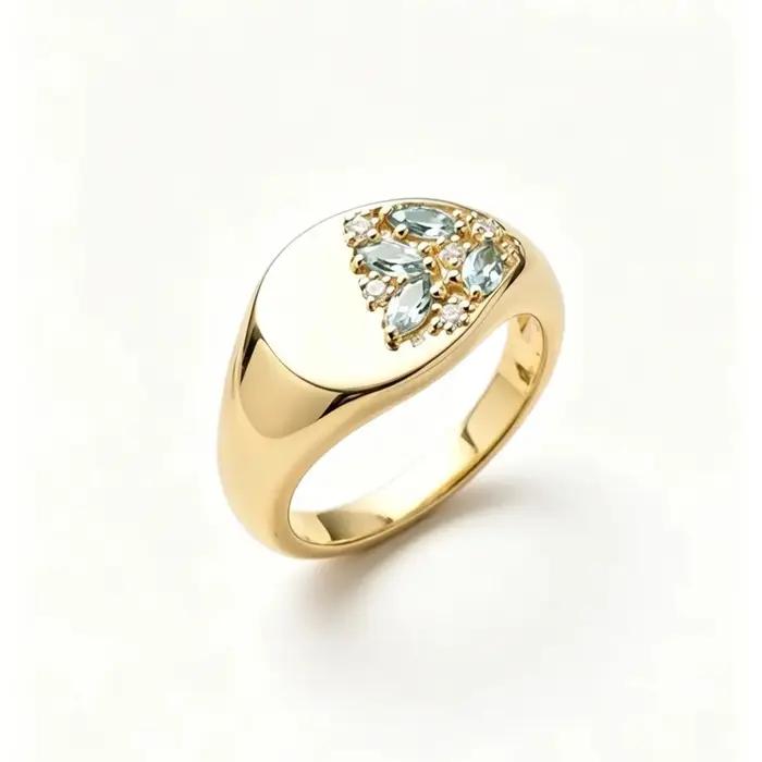 Bague signet vintage en or avec incrustation de zircon bleu