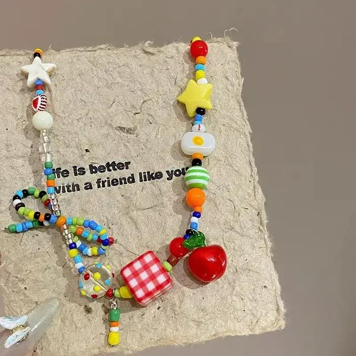 Collier ras du cou avec nœud de fruits de pomme