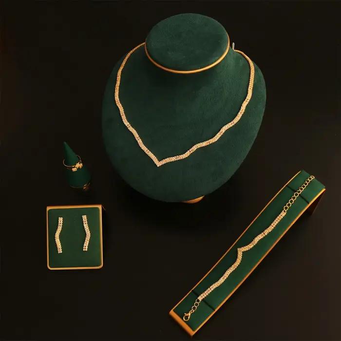 Ensemble luxueux collier, bracelet et boucles d'oreilles en pierres précieuses ondulées d'eau, bijou