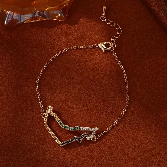 Bracelet patriotique avec carte des Émirats arabes unis en cristal, design éblouissant, finition dorée polie avec une carte détaillée des Émirats arabes unis, incrusté.