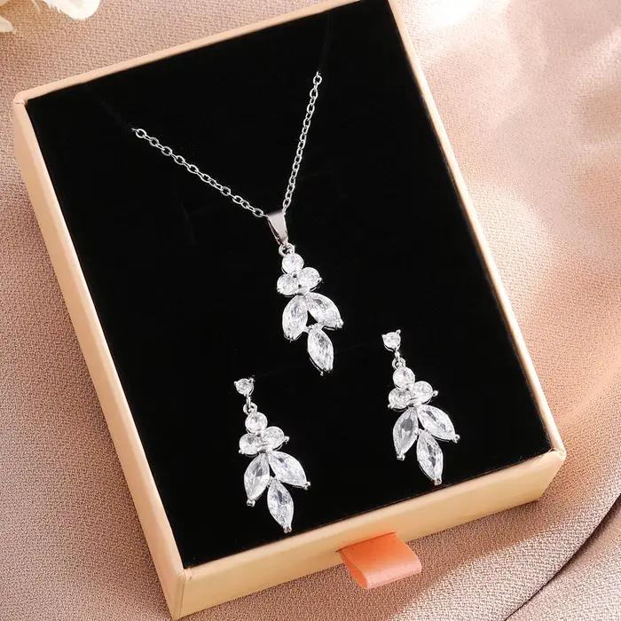 ZAKOL classique Marique feuille AAA Zircon boucles d'oreilles collier ensemble de bijoux de mariage avec boîte rose