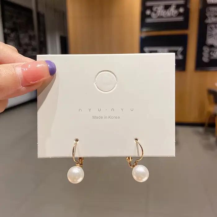 Boucles d'oreilles rondes simples en perles blanches pour femmes, boucles d'oreilles boule, Europe et Amérique, cadeau de bijoux, livraison directe